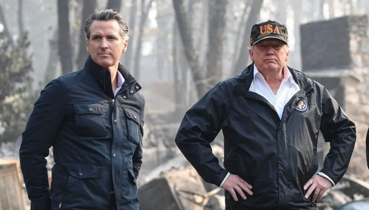 President Donald Trump (R) looks on with California Gov.-elect Gavin Newsom, as they view damage from wildfires in Paradise, Calif., on Nov. 17, 2018. (Saul Loeb/AFP via Getty Images)