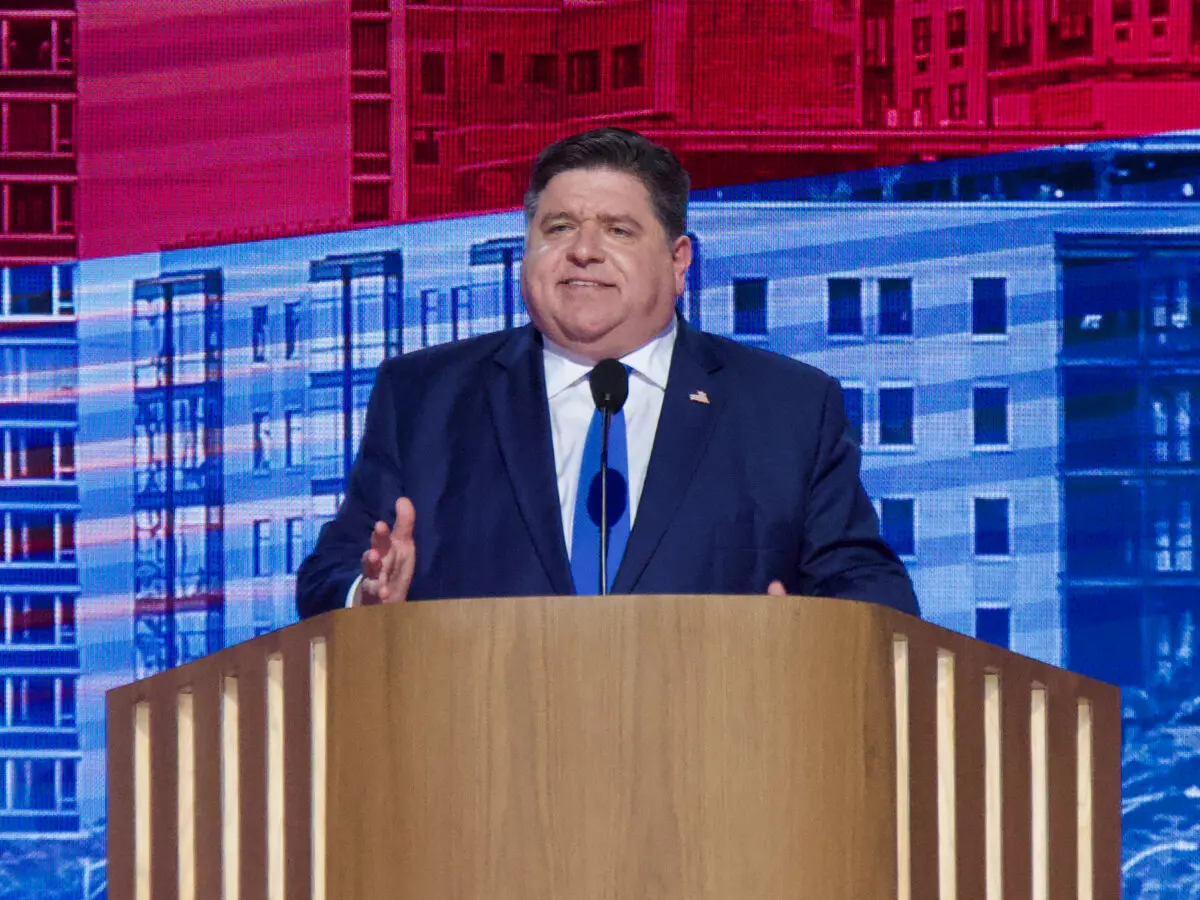 Illinois Gov. J.B. Pritzker addresses the crowd at the Democratic National Convention in Chicago, Illinois, on Aug. 20, 2024. (Travis Gillmore/The Epoch Times)