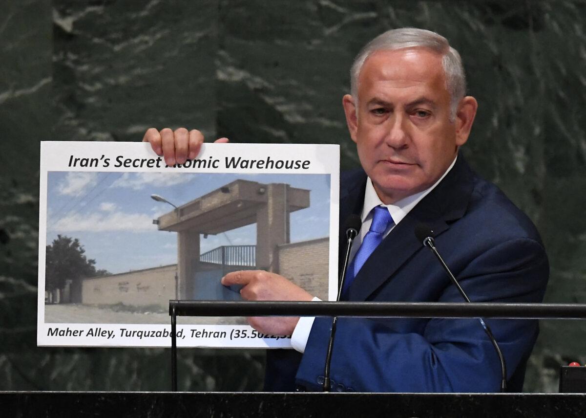 Israeli Prime Minister Benjamin Netanyahu points to a secret Iranian nuclear site at Turquzabad during a speech at the United Nations in New York, on Sept. 27, 2018. (Timothy A. Clary/AFP via Getty Images)