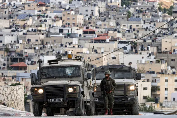 Israeli forces gather on a road during a raid at the al-Faraa camp for Palestinian refugees north of Nablus city in the occupied West Bank on Oct. 10, 2024. (JAAFAR ASHTIYEH/AFP via Getty Images)