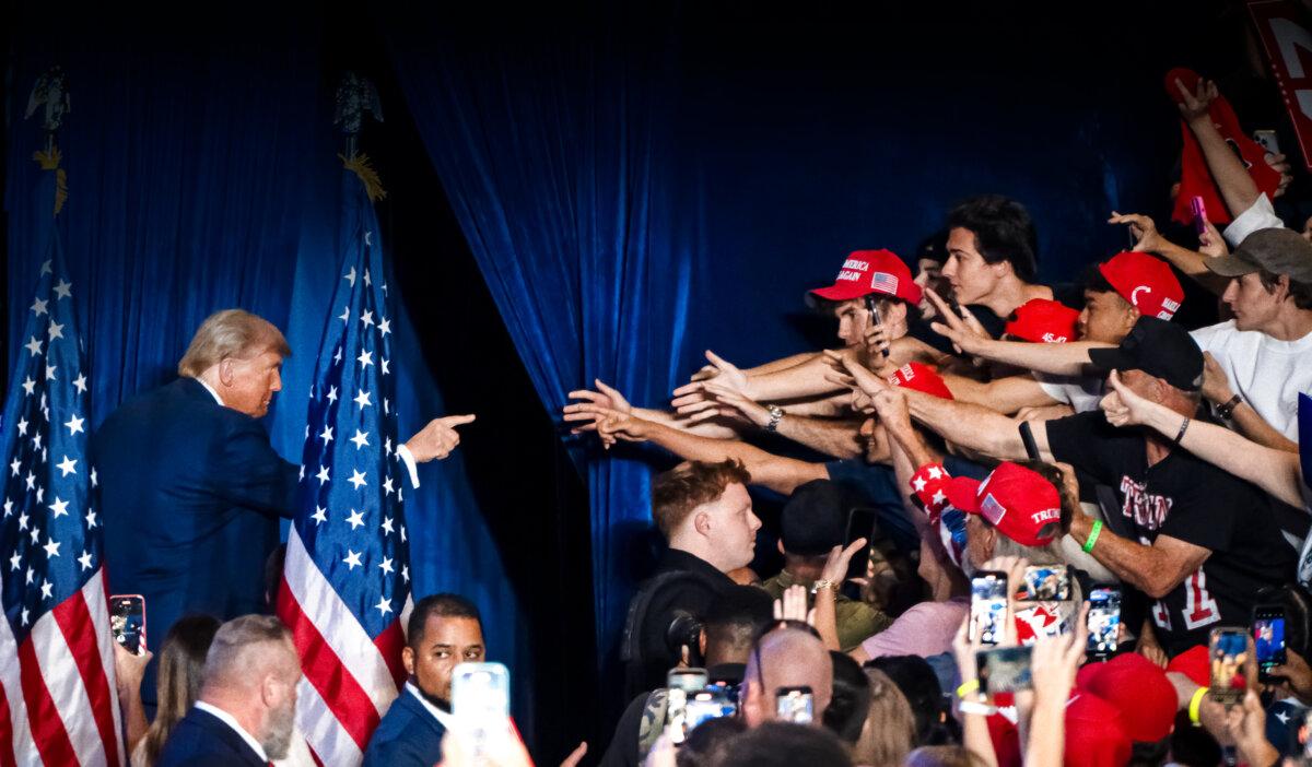 Republican presidential candidate former President Donald Trump interacts with supporters at a campaign rally at Mullet Arena in Tempe, Ariz., on Oct. 24, 2024. (Rebecca Noble/AFP via Getty Images)