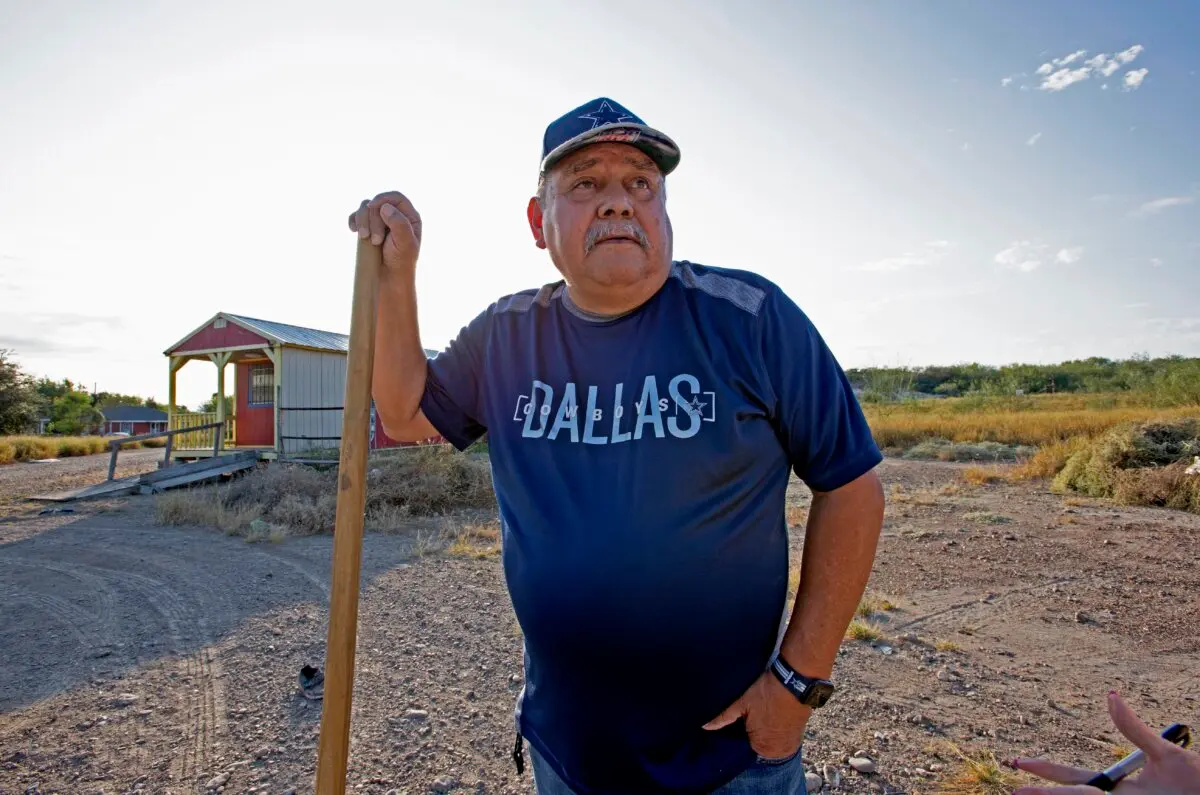 Jorge Arellano, 68, pauses while working on a property on Nov. 9, 2024, in Rio Grande City, Texas, to discuss politics.  (Bobby Sanchez for The Epoch Times)