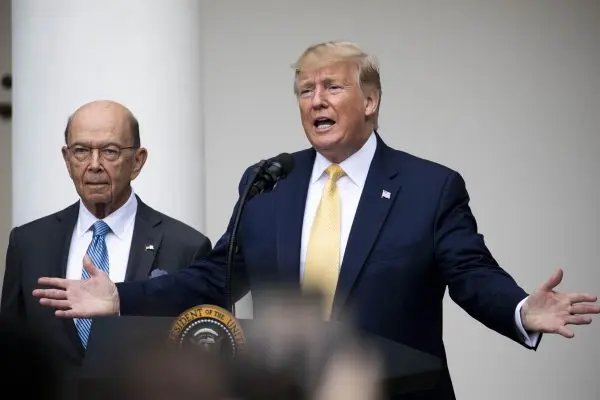 Commerce Secretary Wilbur Ross looks on as President Donald Trump announces an executive action to tally American citizenship, in the White House Rose Garden in Washington, on July 11, 2019. (Charlotte Cuthbertson/The Epoch Times)