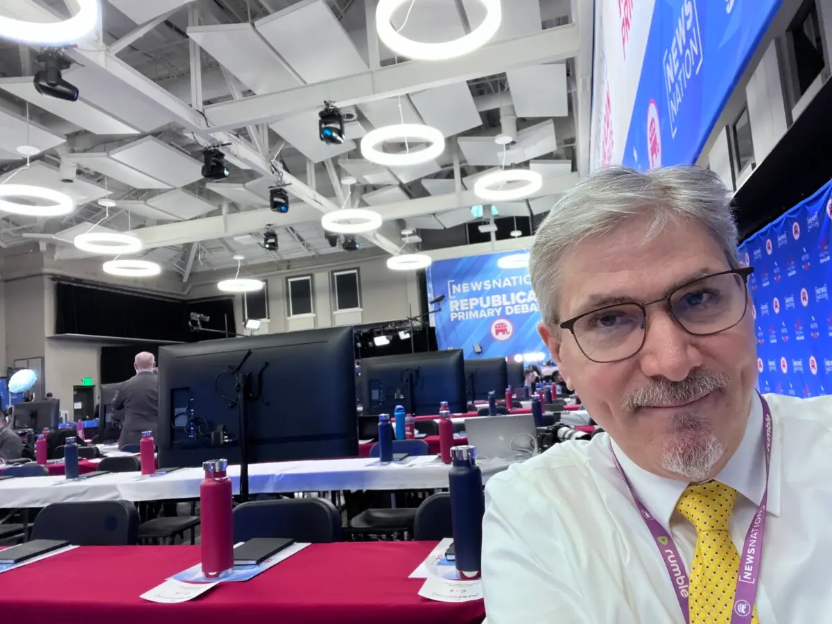 Epoch Times reporter Lawrence Wilson prepares to cover the Republican presidential primary debate at the University of Alabama in Tuscaloosa on Dec. 6, 2023. (Lawrence Wilson/The Epoch Times)