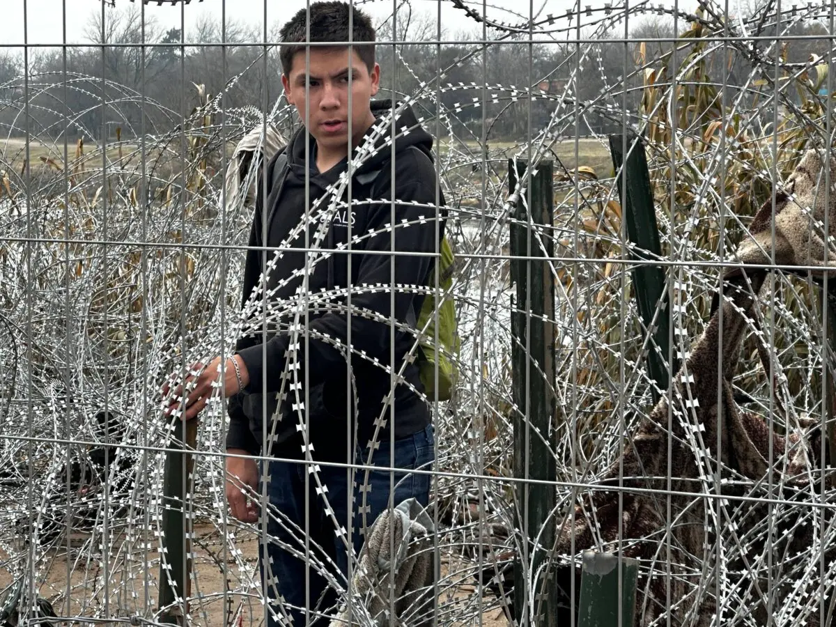 An illegal immigrant from Guatemala reaches a dead end on trying to enter Shelby Park in Eagle Pass, Texas, on Jan. 23, 2024. (Darlene McCormick Sanchez/The Epoch Times)