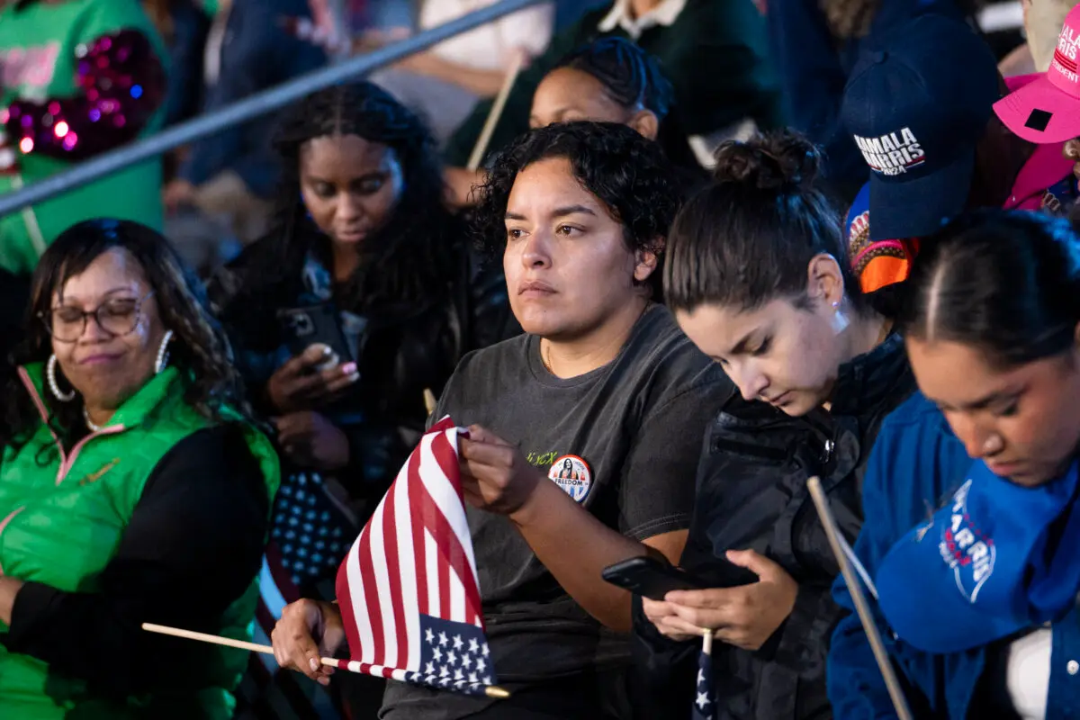 Supporters of Democratic presidential nominee Vice President Kamala Harris watch the election results at her election watch party at Howard University in Washington on Nov. 6, 2024. (Madalina Vasiliu/The Epoch Times)