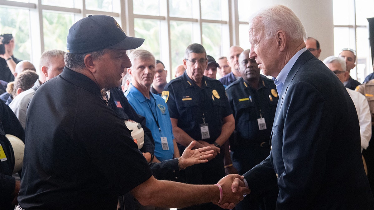 Florida CFO Jimmy Patronis shakes hands with President Joe Biden