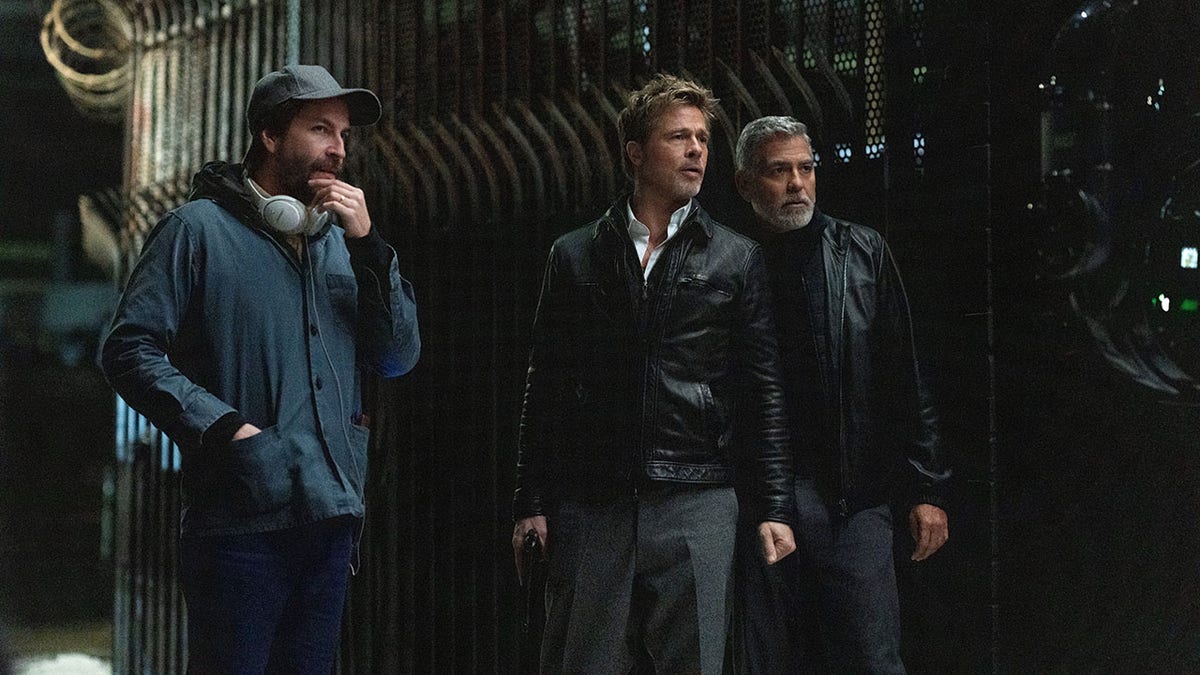 Jon Watts on set with Brad Pitt and George Clooney