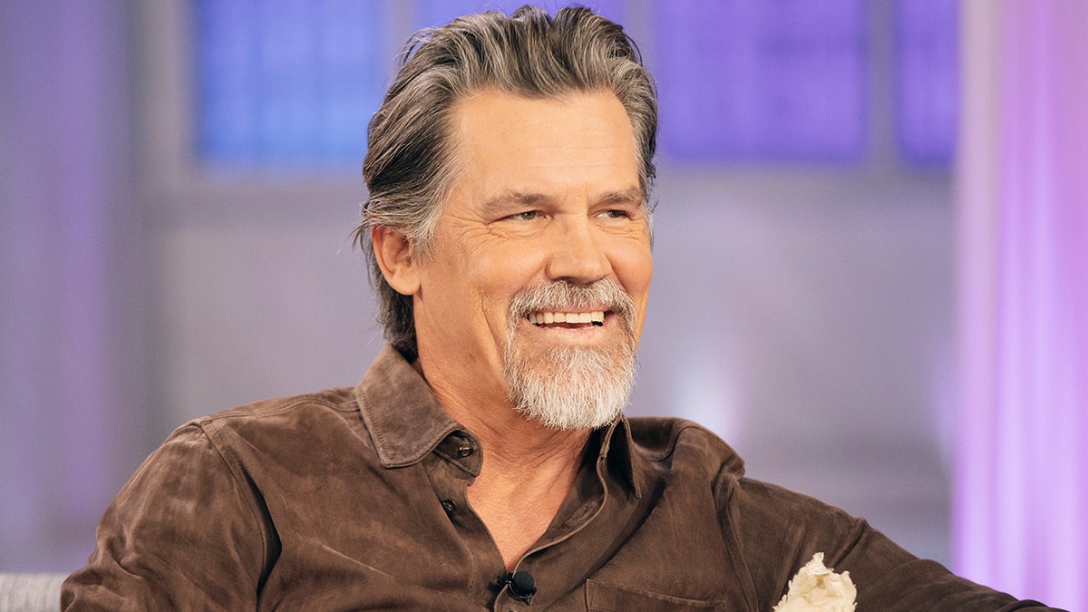 Josh Brolin wears brown leather shirt on Kelly Clarkson's talk show