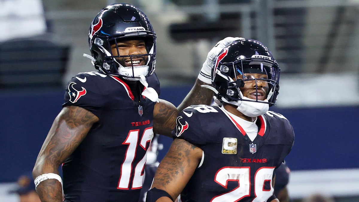 Nico Collins and Joe Mixon celebrate touchdown