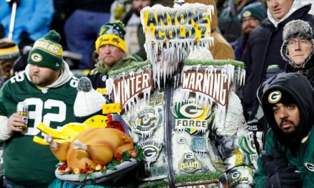 Video of bundled-up Dolphins players warming up at Lambeau Field goes viral after Thanksgiving Day loss