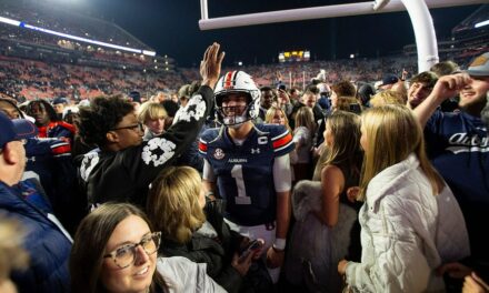 Unranked Auburn upsets CFP-hopeful Texas A&M in 4 OT thriller after game-tying score is dropped