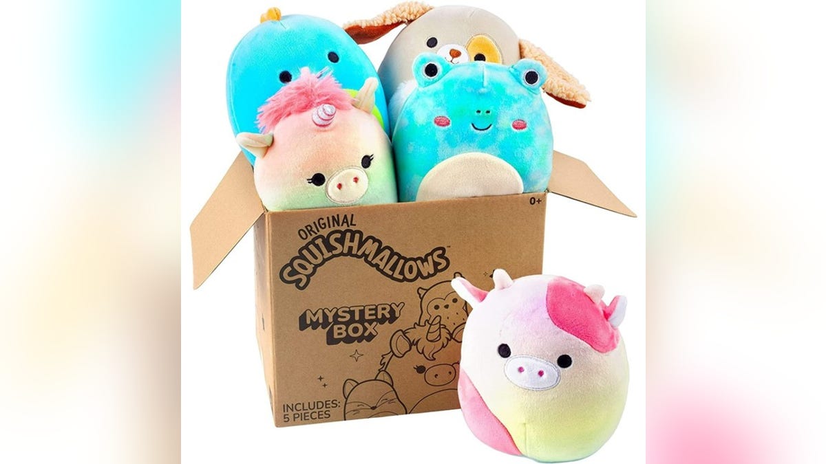 Unpack a box of cute Squishmallows. 