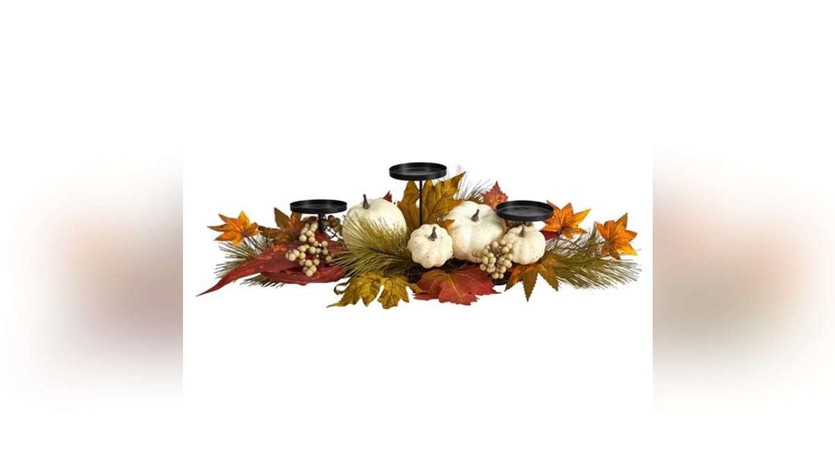 Pumpkins and leaves make for an ideal Thanksgiving centerpiece. 