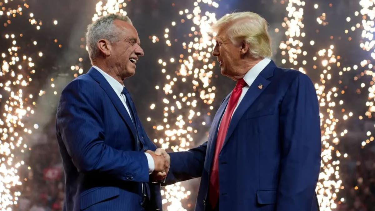 RFK and Trump shaking hands with fireworks in background