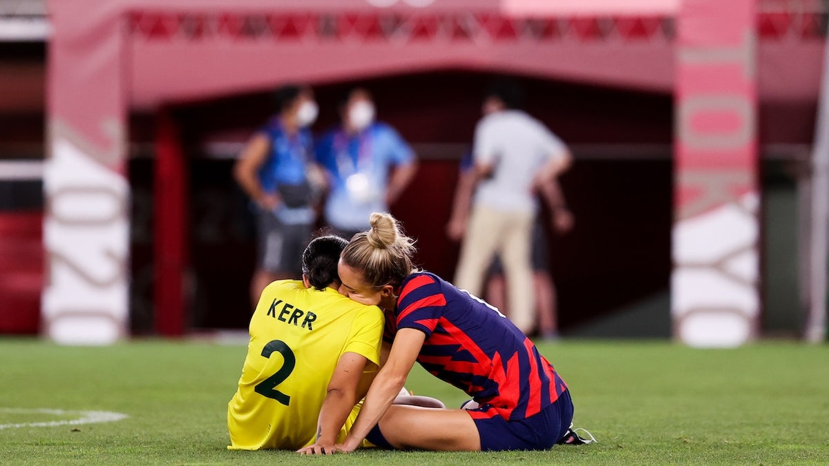 Kristie Mewis of United States embraces Sam Kerr of Australia after the Olympic football bronze medal match between United States and Australia at Kashima Stadium on August 05, 2021 in Kashima, Ibaraki, Japan. 