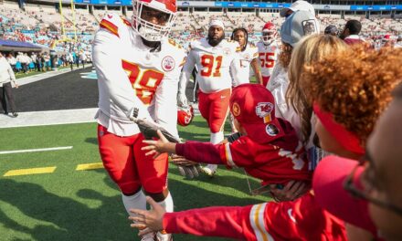 Chiefs lineman Tershawn Wharton catches young fan after falling over barrier at Panthers’ stadium