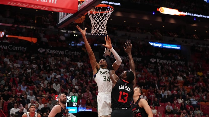 Milwaukee Bucks All-Star Giannis Antetokounmpo goes to the basket on Miami Heat C Bam Adebayo at Kaseya Center. (Jasen Vinlove-USA TODAY Sports)