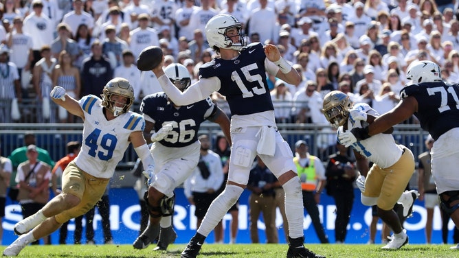 Penn State Nittany Lions QB Drew Allar drops back to pass against the UCLA Bruins at Beaver Stadium. (Matthew O'Haren-Imagn Images)