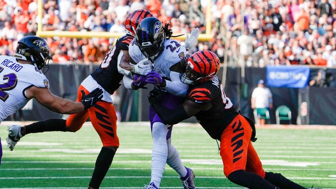 The Cincinnati Bengals take down Baltimore Ravens RB Derrick Henry at Payor Stadium in NFL Week 5. (Cara Owsley/The Enquirer-USA TODAY NETWORK via Imagn Images)