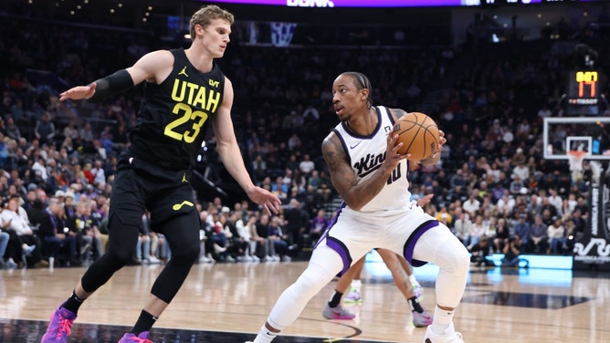 Sacramento Kings SF DeMar DeRozan taking a step-back vs. Utah Jazz PF Lauri Markkanen at Delta Center in Salt Lake City. (Rob Gray-Imagn Images)