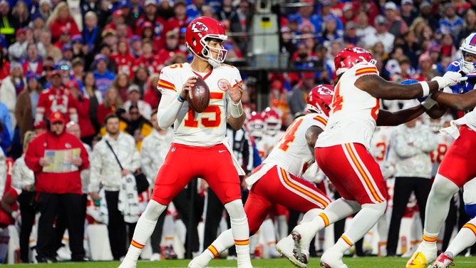 Kansas City Chiefs QB Patrick Mahomes drops back to pass against the Buffalo Bills at Highmark Stadium. (Gregory Fisher and Junfu Han-Imagn Images) 