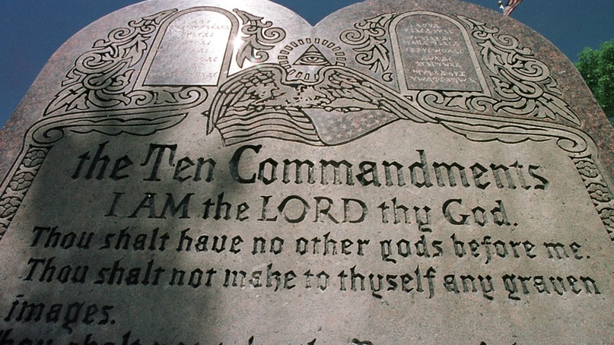 391223 03: A 42-year-old Ten Commandments sculpture is on display in front of city hall June 27, 2001 in Grand Junction, CO. The sculpture became a target of controversy betweem the ACLU and the Christian Coalition''s American Center for Law and Justice when the ACLU began a legal offensive aimed at removing displays of the Ten Commandments from city halls and other civic buildings throughout the United States. (Photo by Michael Smith/Getty Images)