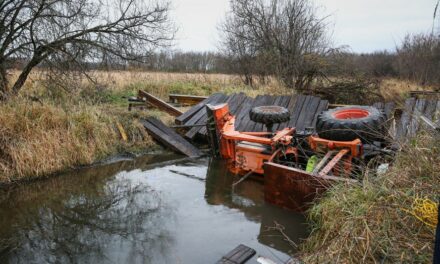 Illinois man rescued after bridge collapse causes tractor to trap him in creek