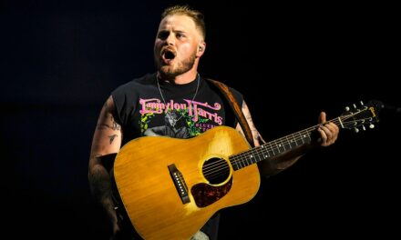 Zach Bryan scolds fan for throwing object on stage during concert