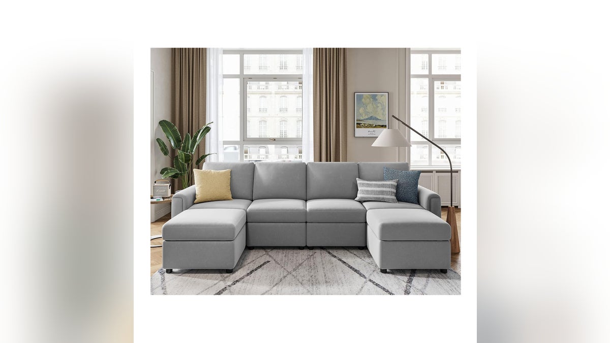 A comfy couch with plenty of storage. 