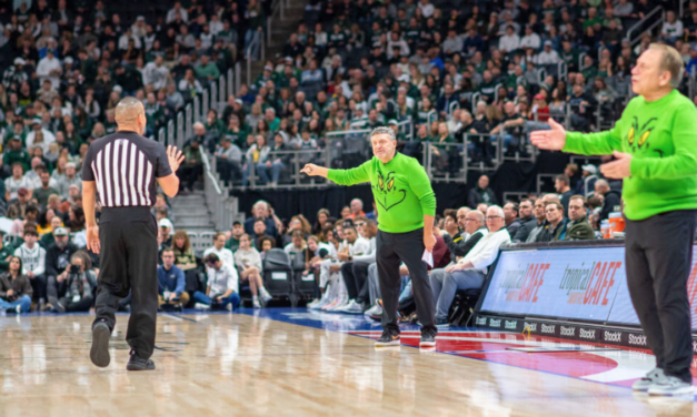 Greg Kampe, Tom Izzo Wear Matching Grinch Sweaters While Coaching Against Each Other