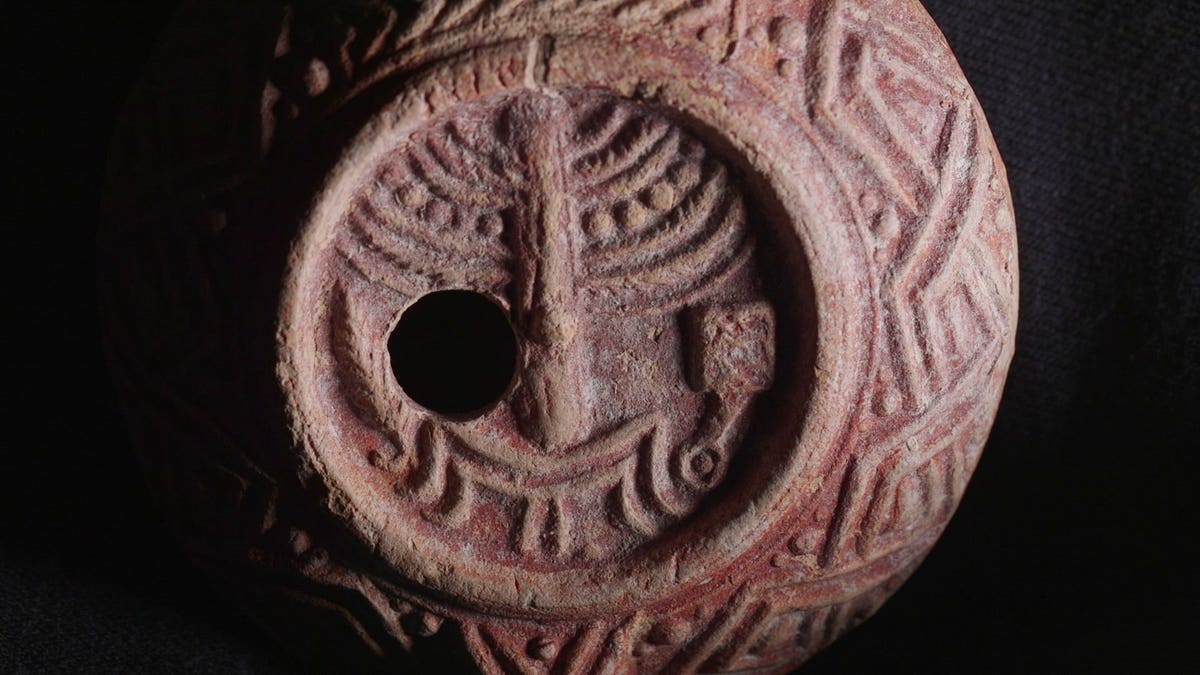 Close-up of oil lamp details