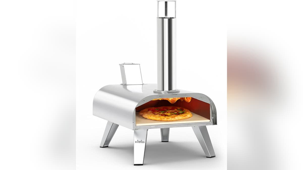 A pizza oven makes pizza fast. 