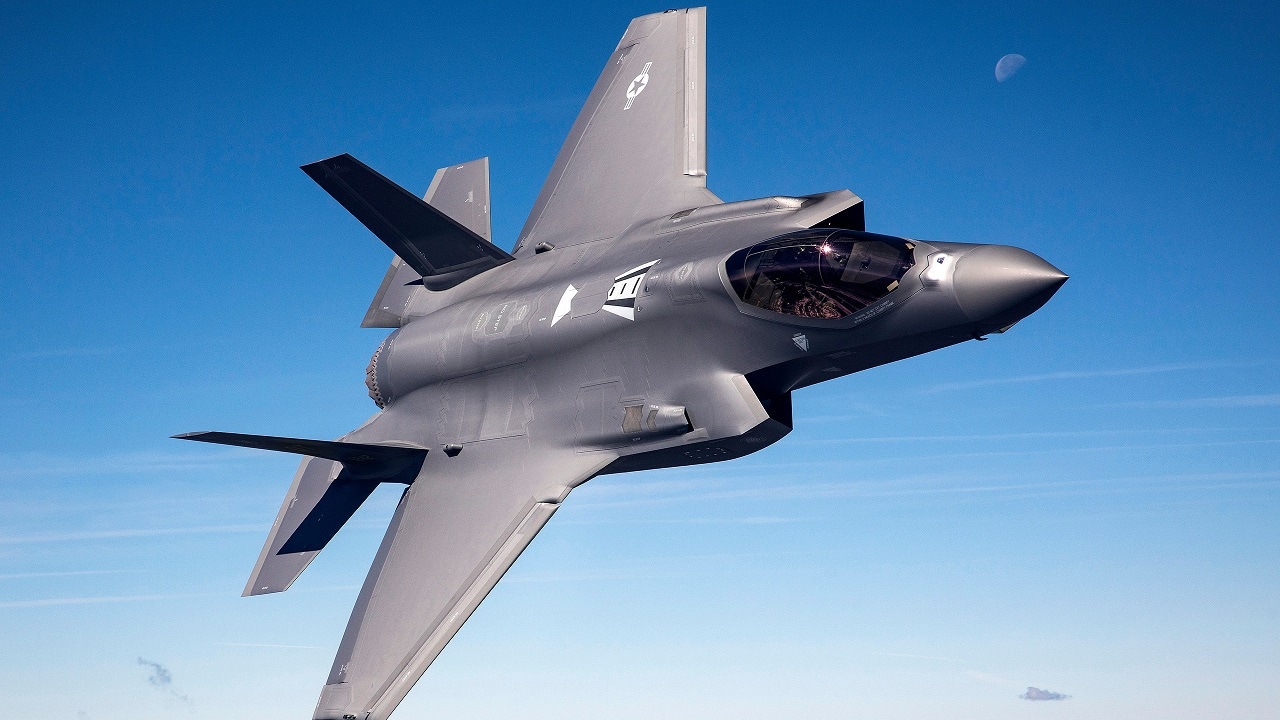 F-35 AF-184 flown by Lt. Cdr. Jonathan 'Dos' Beaton, in Owen's Moa, with Whitney and snowcapped Sierra Nevadas in background