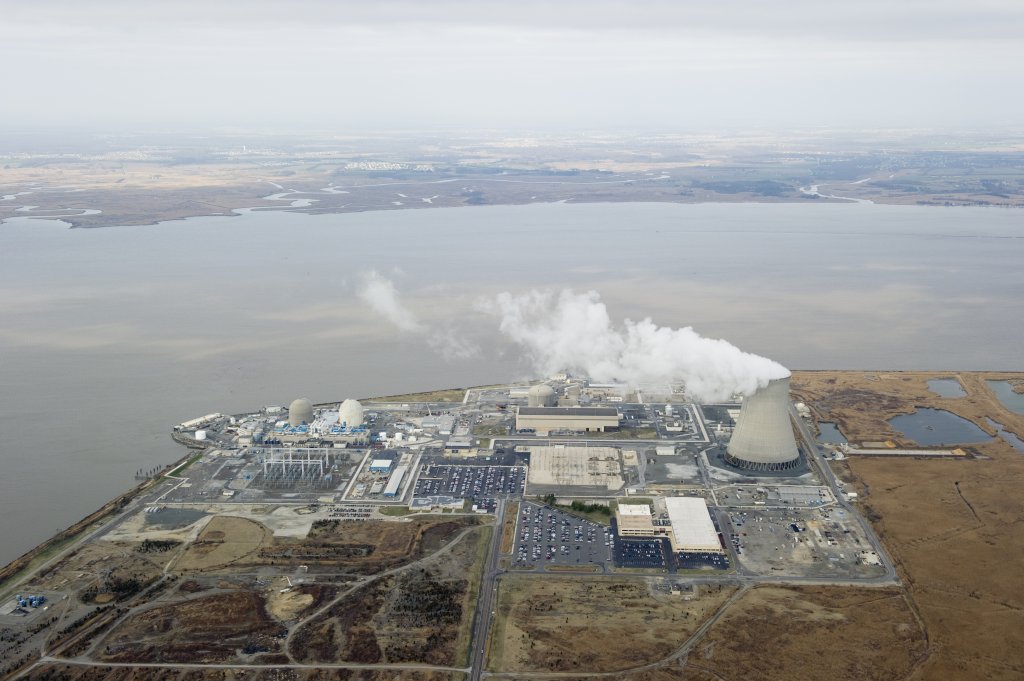 An aerial view of the Salem Nuclear Power Plant (L, two domes) and Hope Creek Nuclear Generating Station (C, dome behind rectangular building) March 22, 2011, situated on the Delaware River in Lower Alloways Township, New Jersey. Salem is a dual unit pressurized water reactor and Hope Creek a single unit boiling water reactor. AFP PHOTO/Stan HONDA (Photo credit should read STAN HONDA/AFP via Getty Images)