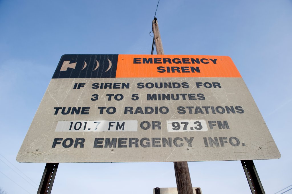 A sign instructing residents what to do when hearing the emergency siren is seen March 22, 2011 in Lower Alloways Township, New Jersey, site of the Salem Nuclear Power Plant and Hope Creek Nuclear Generating Station. Salem is a dual unit pressurized water reactor and Hope Creek is a single unit boiling water reactor situated on the Delaware River. AFP PHOTO/Stan HONDA (Photo credit should read STAN HONDA/AFP via Getty Images)