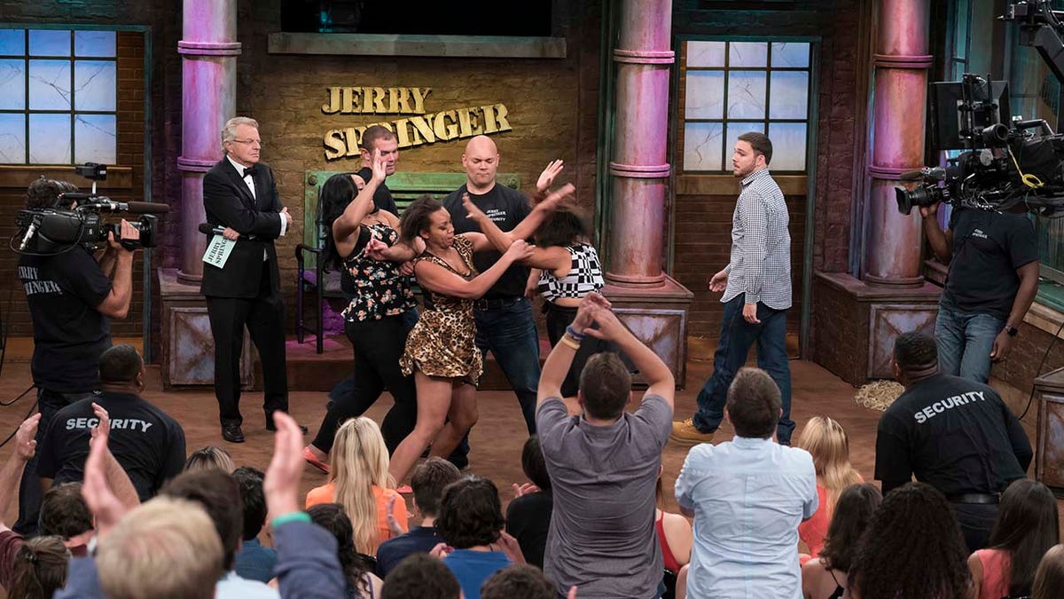 Talk show host Jerry Springer, guests and audience on The Jerry Springer Show