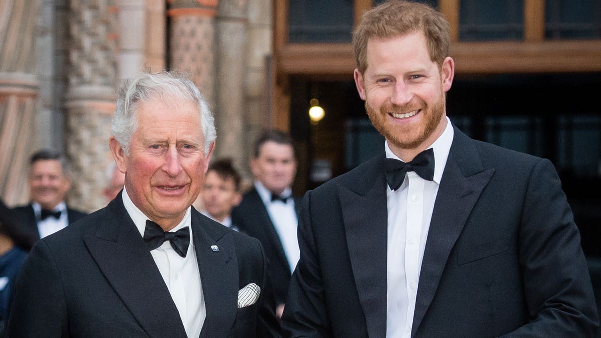 King Charles with Prince Harry in making tuxedos and smiling