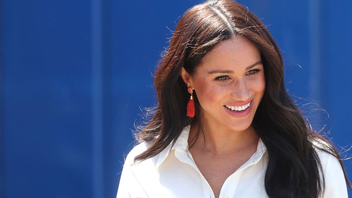 Meghan Markle smiles