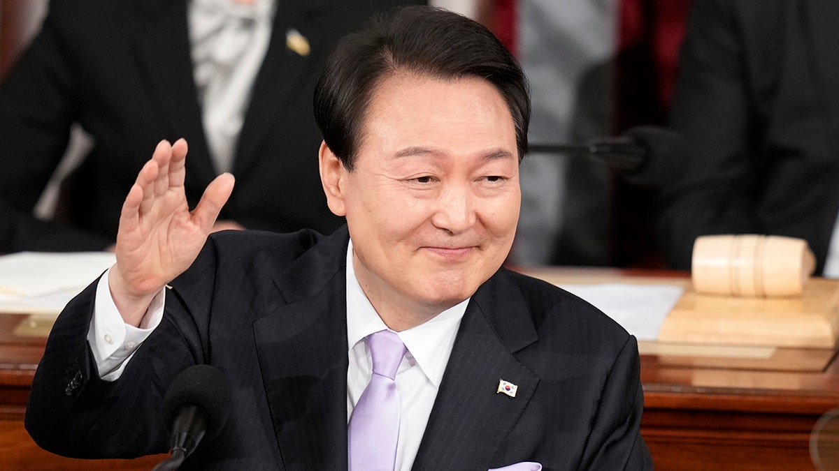 South Korea's President Yoon Suk Yeol waves to joint meeting of the US Congress