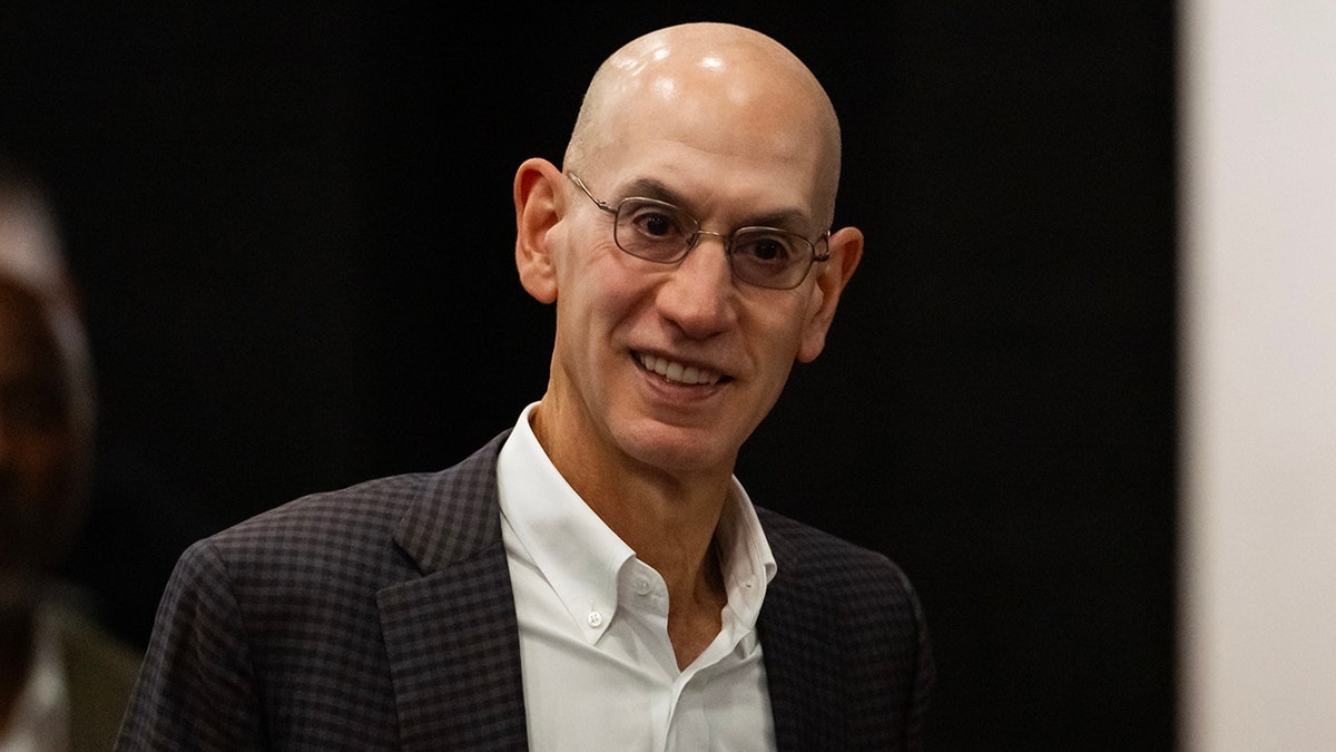 Adam Silver smirks