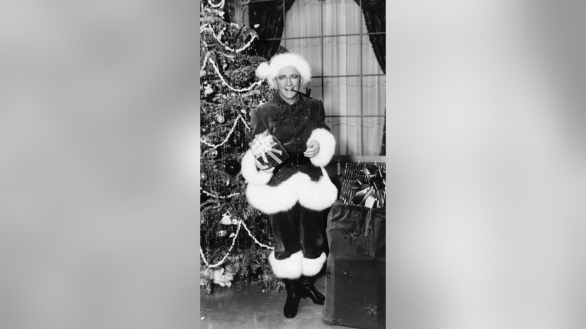 Bing Crosby in a Santa suit