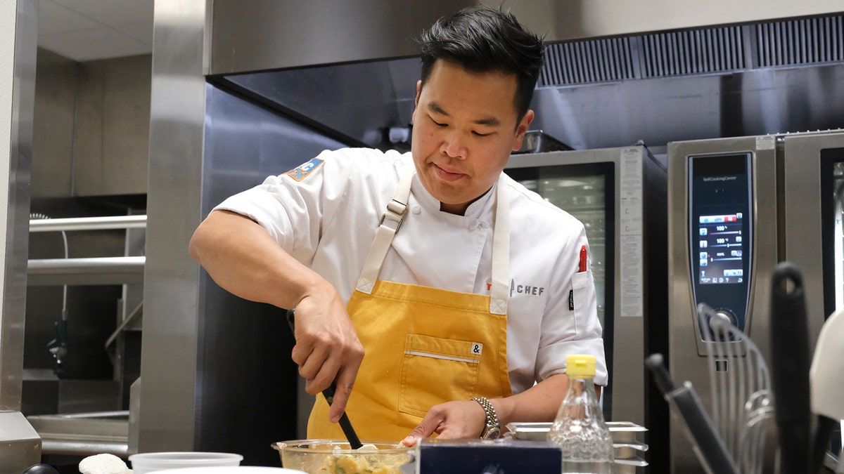 Buddha Lo prepares a dish during the final episode of 