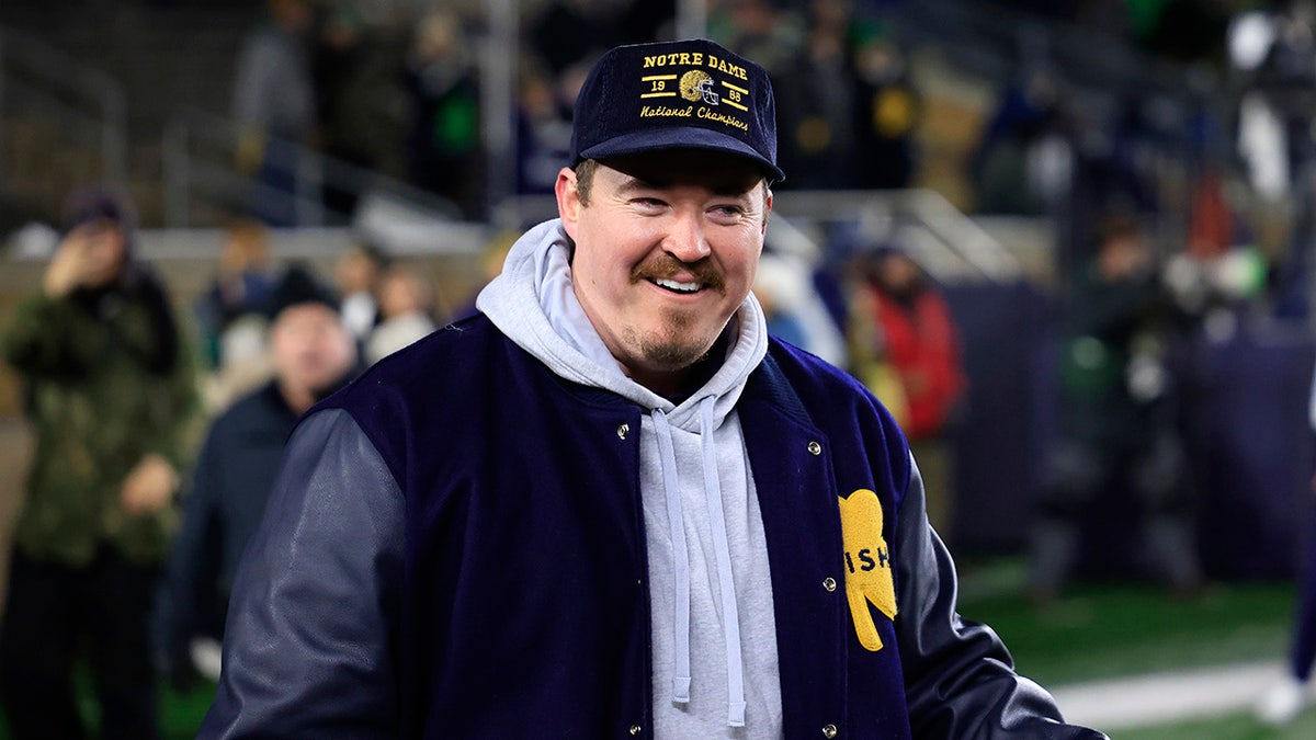 Shane Gillis attends a college football game