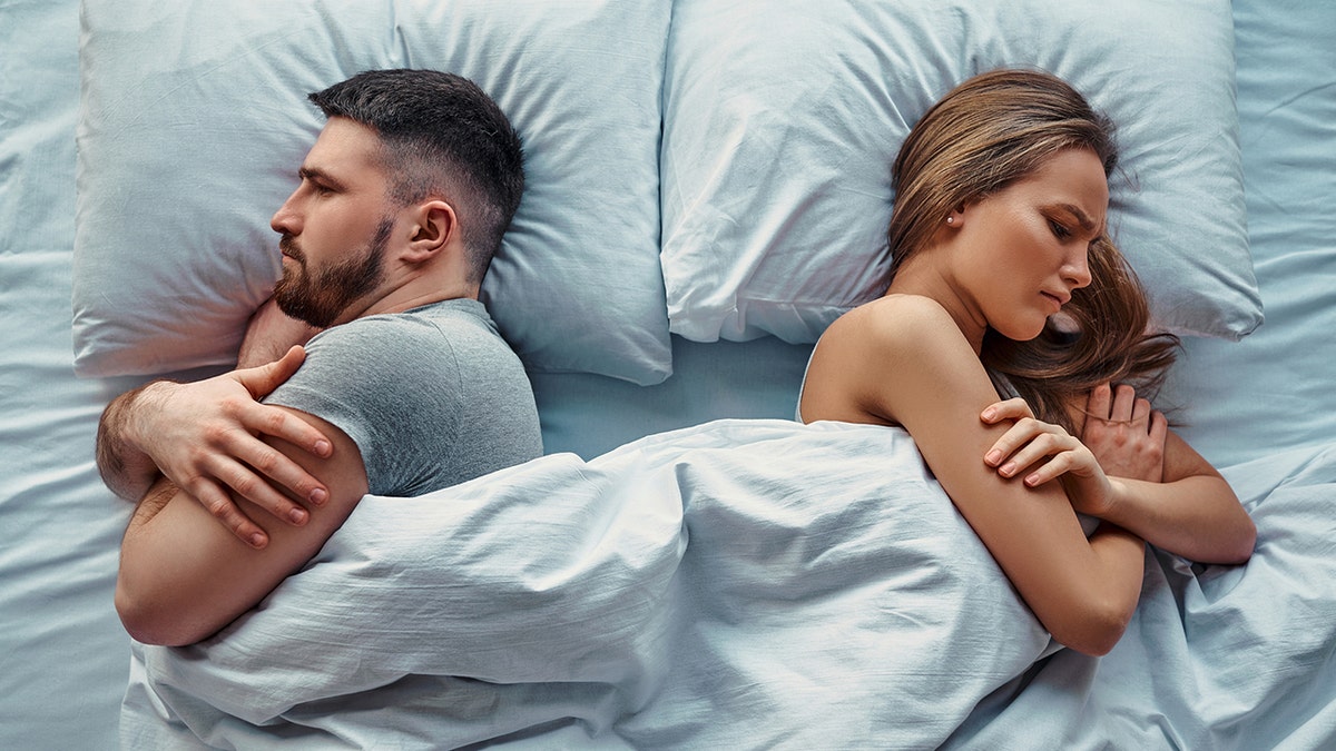 Couple upset in one bed