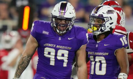 James Madison football star empties the quiver in celebration during bowl game win