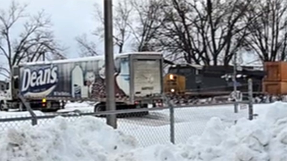 Train collides with truck in Erie, Pa.