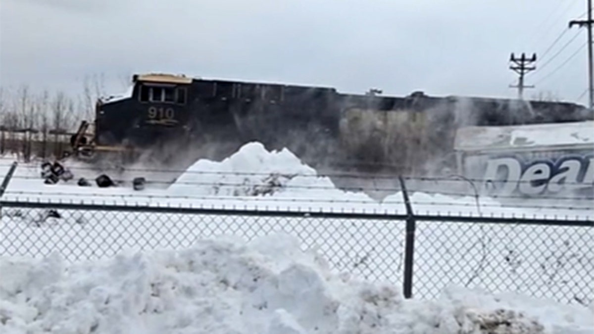 Train slams into truck in Erie