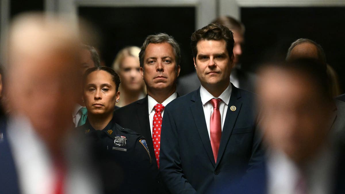 Matt Gaetz, center right, outside courthouse during Trump Manhattan trial