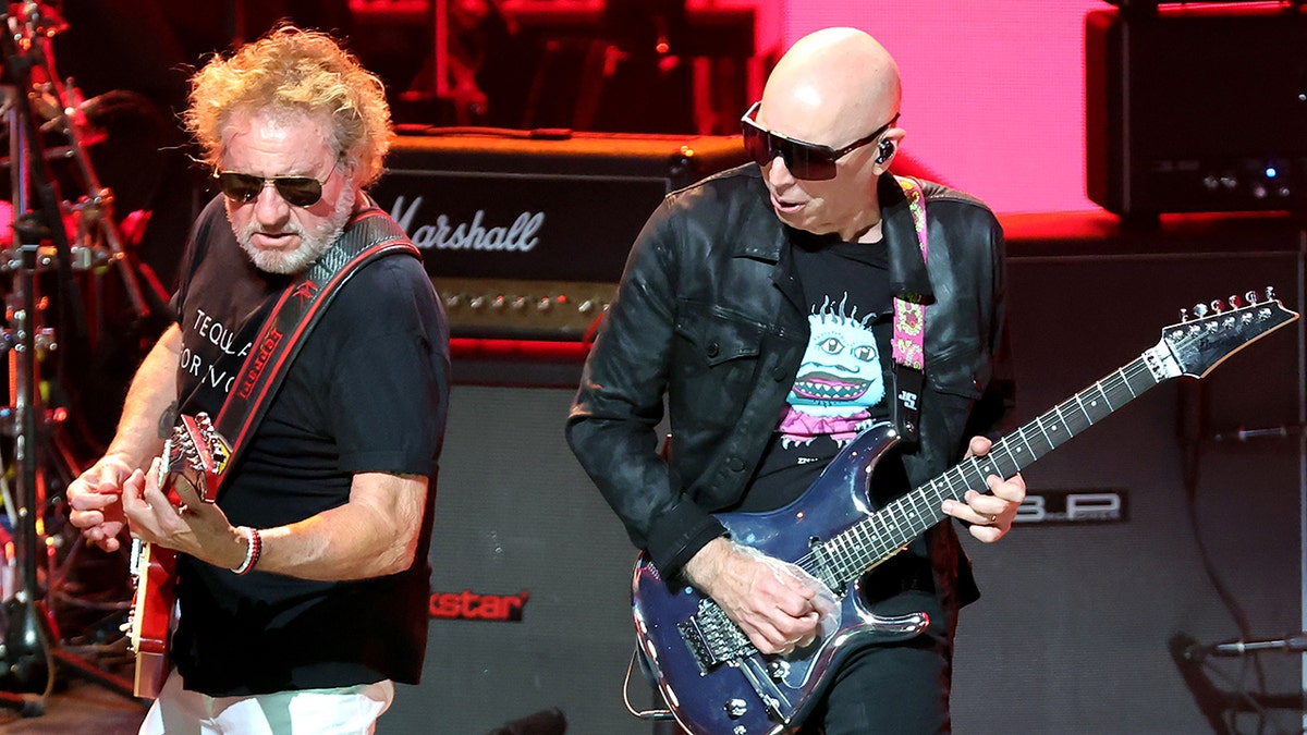 Sammy Hagar and Joe Satriani playing on stage